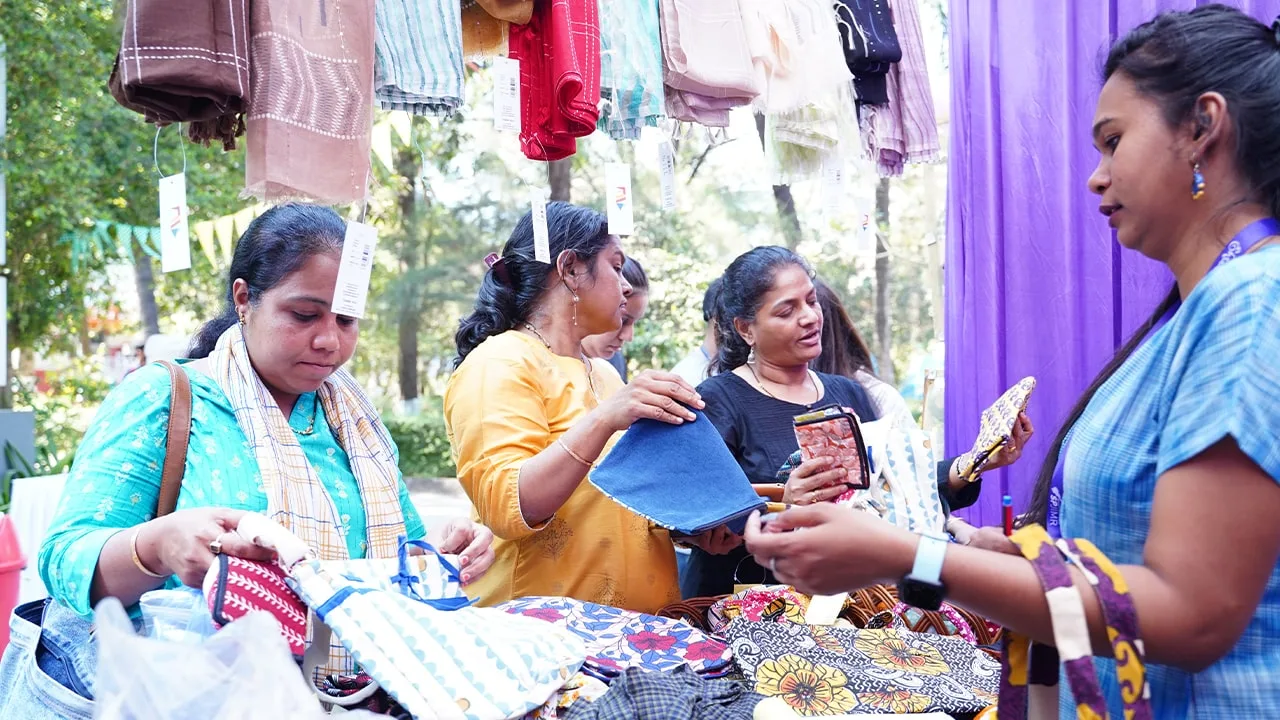Artisan selling handcrafted purses and bags
