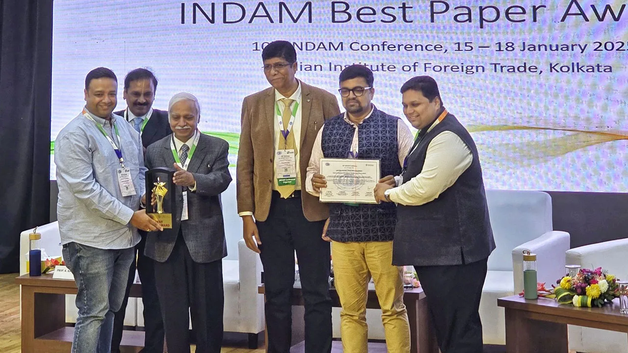 Prof. Ajinkya Navare and Prof. Renuka Kamath win the ‘Best Paper’ award at INDAM 2025