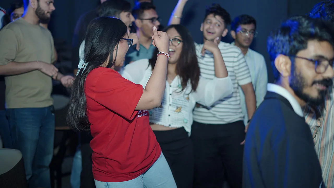 Dance and celebration at the Gyan Auditorium during Dhanda Fest.