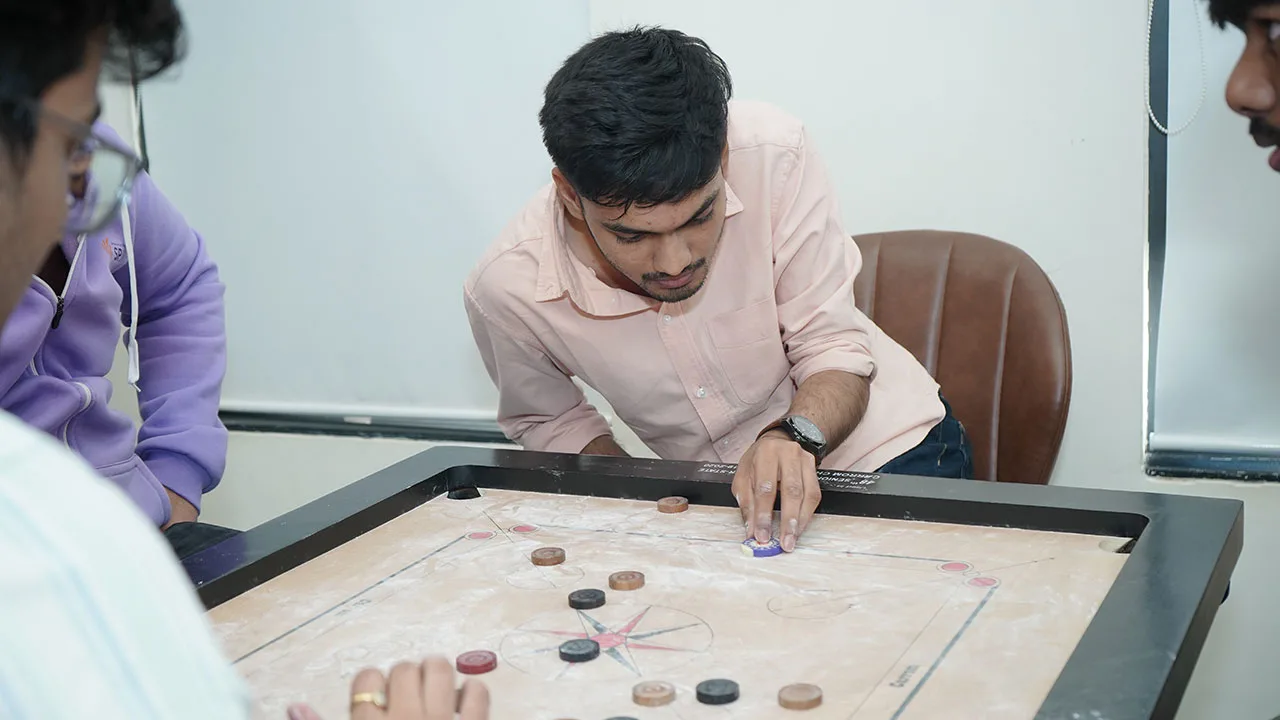 Participants playing carrom at the Dhanda Fest celebration organised by FMB batch 37.