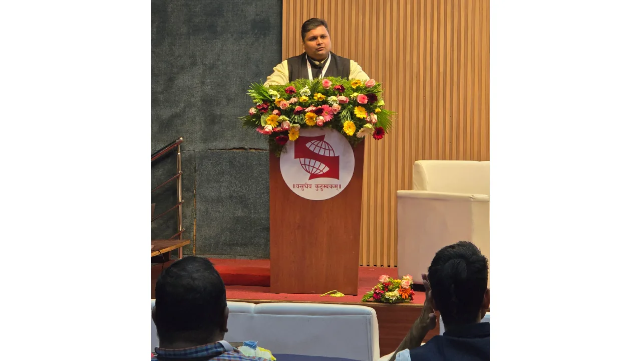 Prof. Ajinkya Navare addressing delegates at the INDAM 2026 Conference hosted at SIBM Pune.