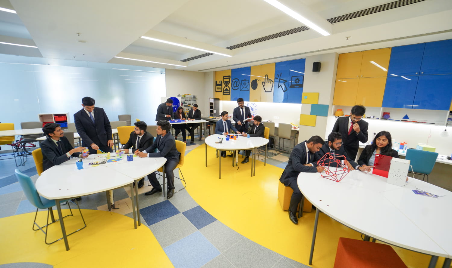 SPJIMR PGDM participants collaborating on real-world business projects SPJIMR PGDM participants collaborating on real-world business projects